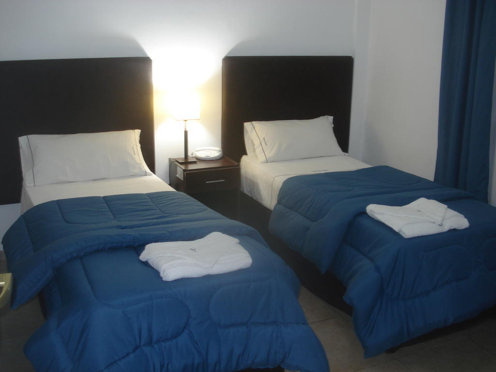 Morada Suites Campana Værelse billede
