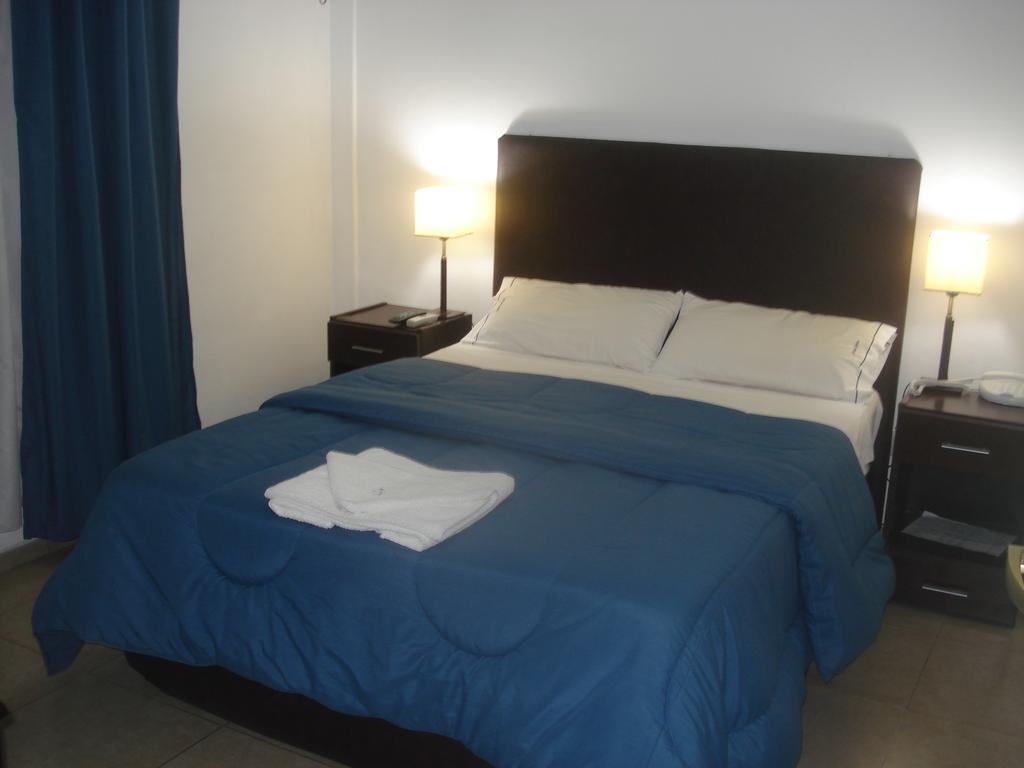 Morada Suites Campana Værelse billede